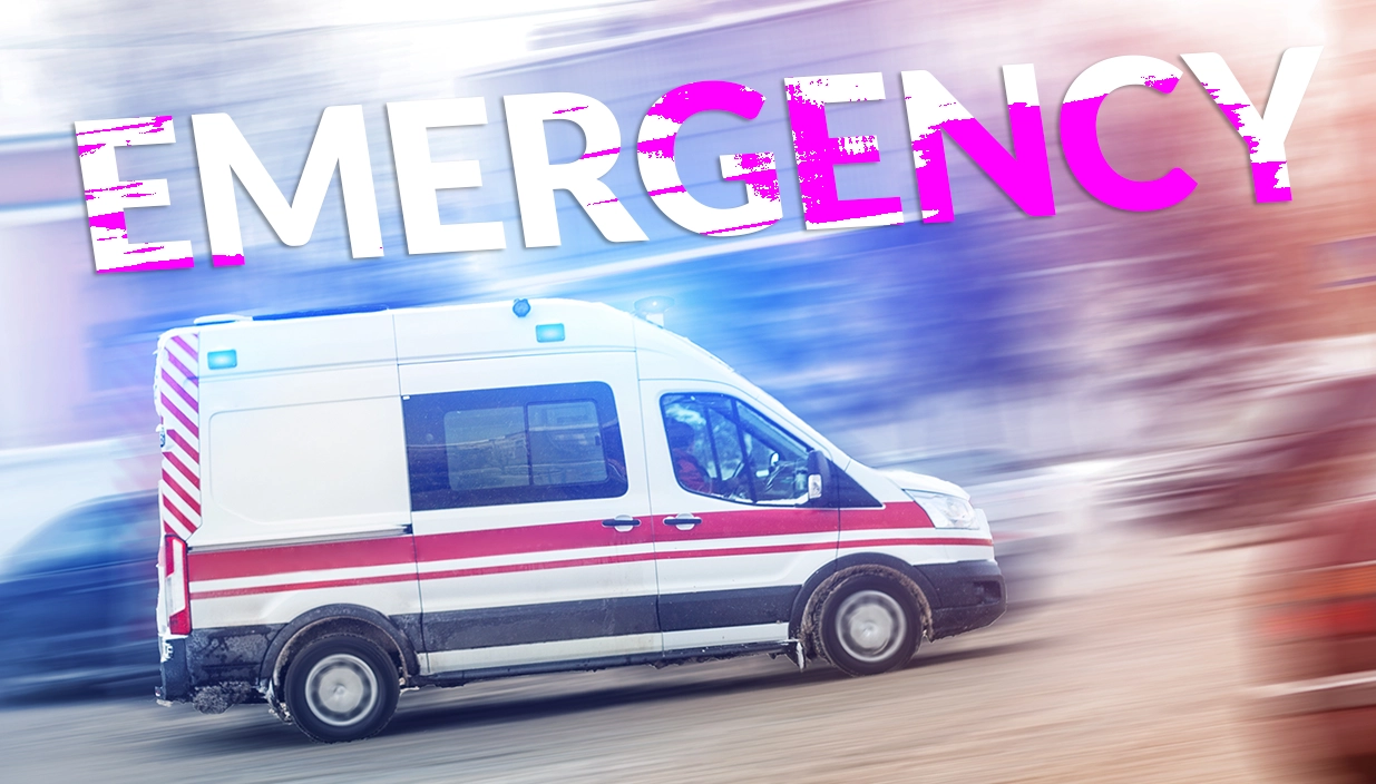 ambulance moving fast with blurred background scene