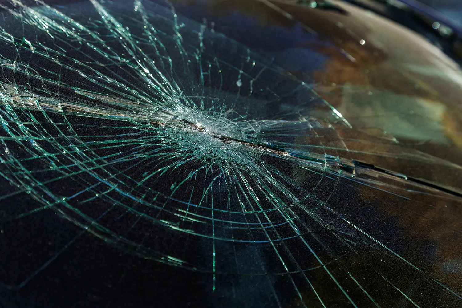 smashed windscreen on car